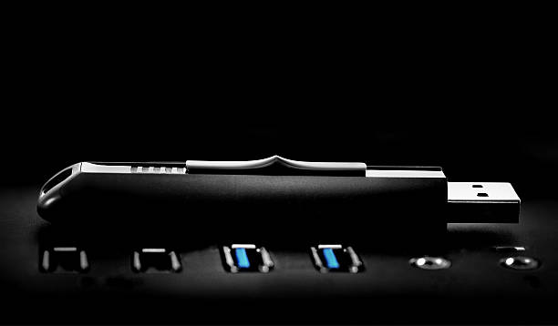 istock Usb stick on black background with ports in the front 187441125
