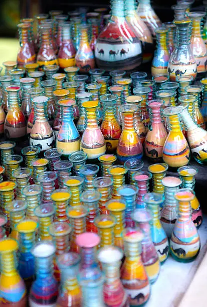 Souvenirs Bottles Full of colorful sand layers forming beautiful shapes and drawings Sold to Visiting Tourists, a Craft art product Most famous in Jordan and you can find it also in Dubai and UAE..