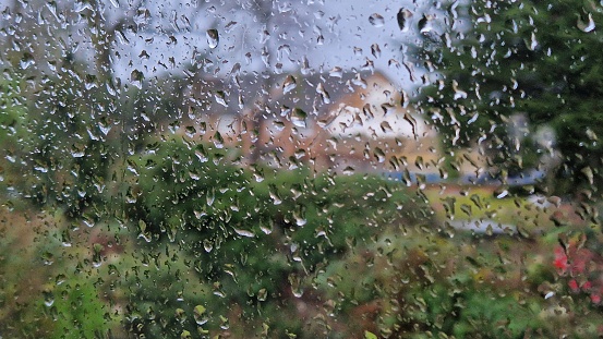 Rainy day in England shot through window December 2023