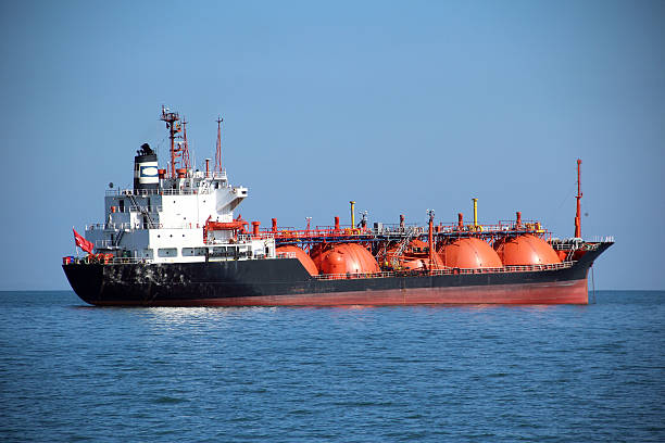 istock cargo ship anchored at sea 187443522
