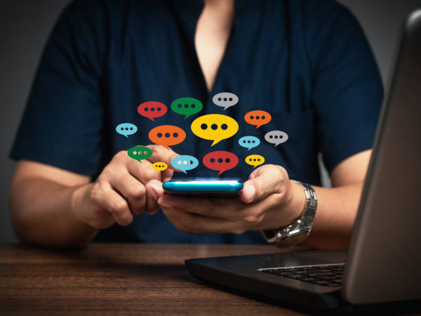 istock Connecting and chatting on the Internet. Digital communication and social media interaction. 1874454348