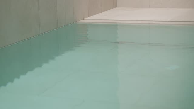 Modern swimming pool with clear water, closeup