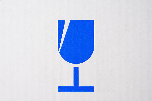 istock Close-up of blue fragile mark on white cardboard box 187447052