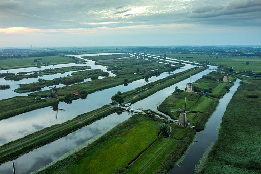 Famous group of windmills in Kinderdijk, Netherlands. Drone point of view.