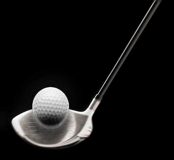 istock Golf Club Driver Hitting Ball on Black 187447843