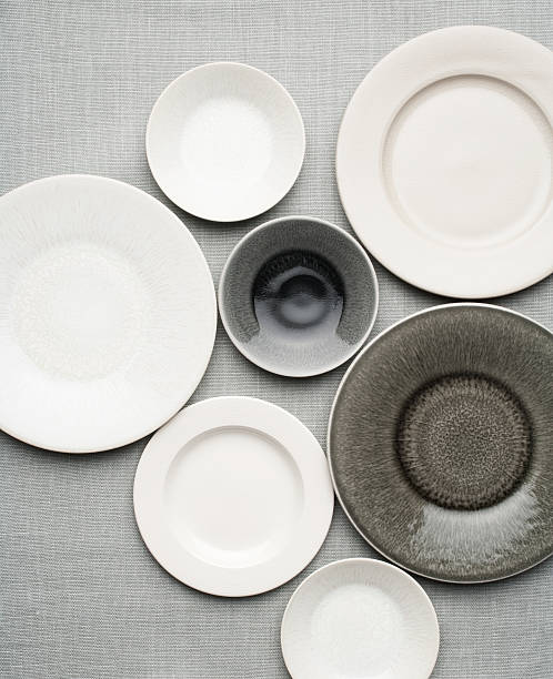 istock Overhead view of several types of plates on a table 187448026