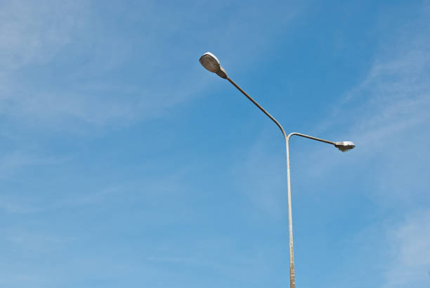 istock Street light pole on a sunny day 187449507