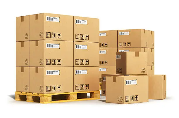 Photo of Cardboard boxes on shipping pallets