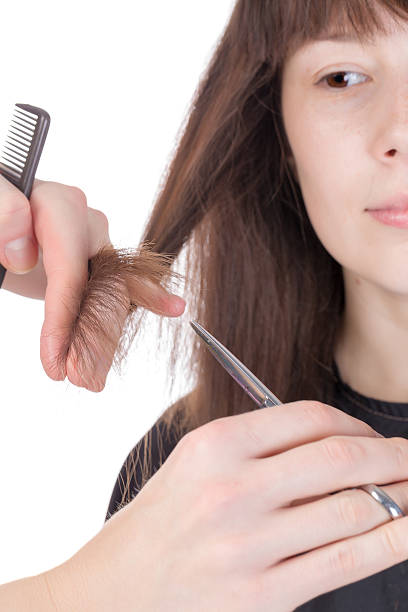 istock Young woman having a hair cut 187452925