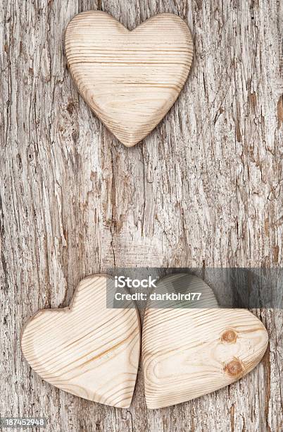 Three Wooden Hearts On The Old Wood Stock Photo - Download Image Now - Ancient, Block Shape, Construction Frame