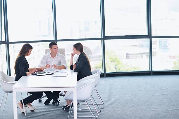 istock business people in a meeting at office 187456413