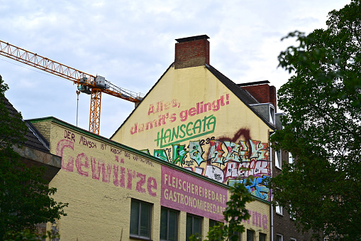 Old advertising on house facade in the Schanzenviertel in Hamburg, Germany