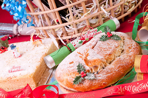 istock Christmas stollen and coconut cake close up 187456750