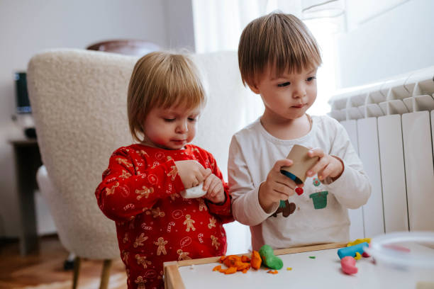 Kids are playing with plasticine