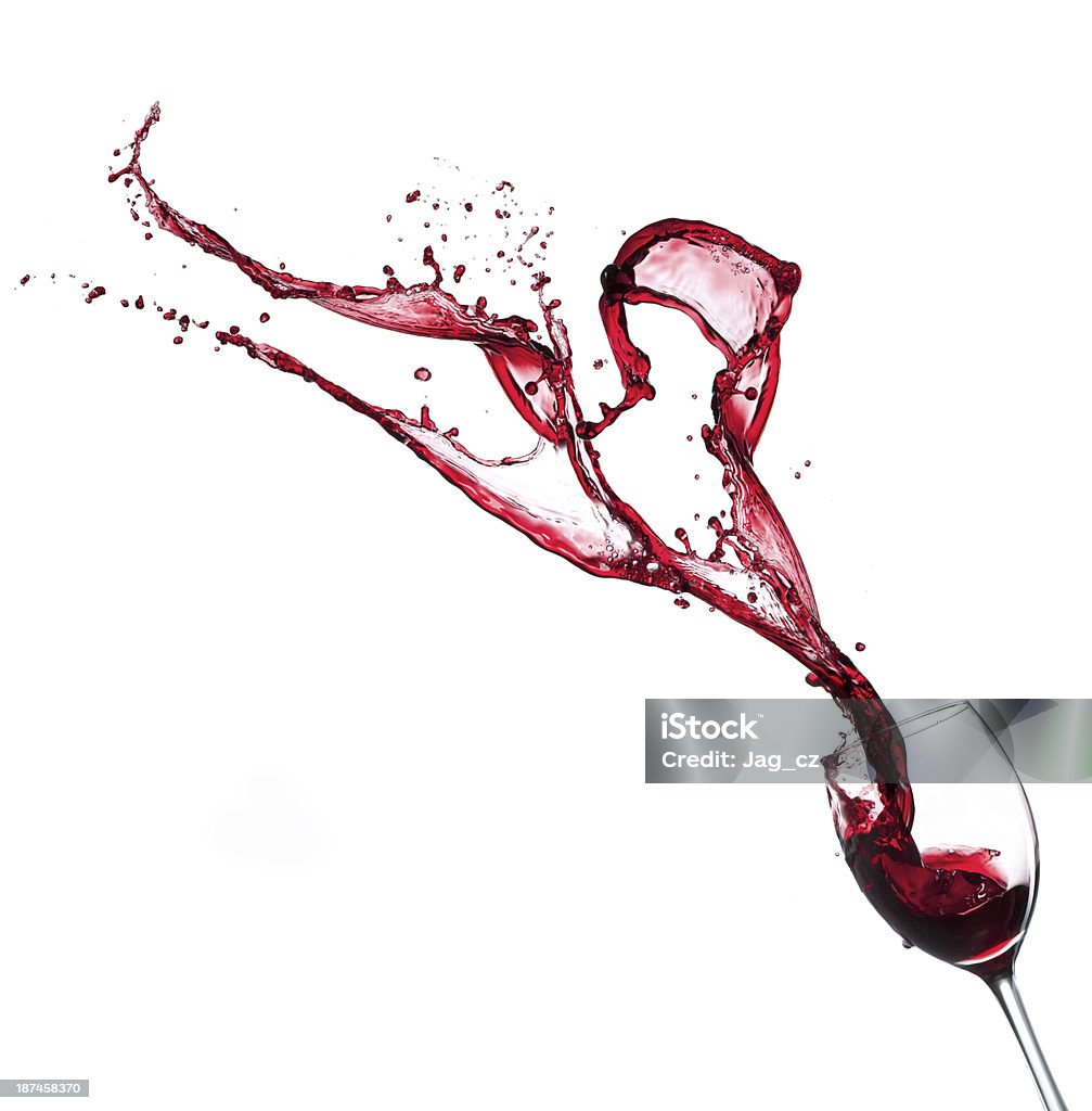 Red wine Red wine splashing from glass, isolated on white background Cut Out Stock Photo