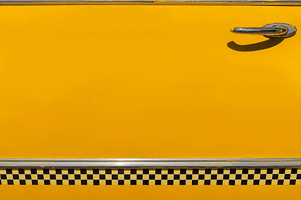 istock Checkered Yellow Taxi Cab Door 187458555
