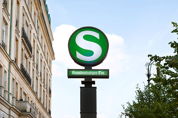 S Bahn entrance at the Brandenburg Gate in Berlin with house and rooms