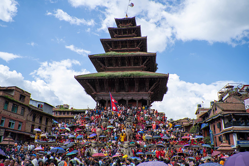 Bhaktapur, Nepal - Aug 12 2022 : Crowd of People at Bhaktapur Durbar Square in the Gaijatra festival of Nepal, Culture of Newari people of Nepal