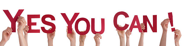 istock People Holding a Red Yes You Can 187458967