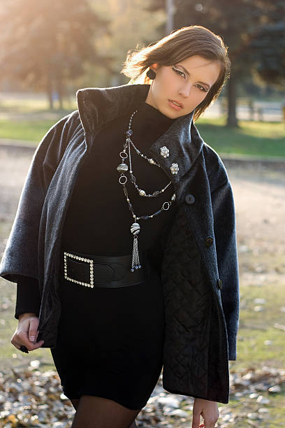 istock elegant young woman 187461426