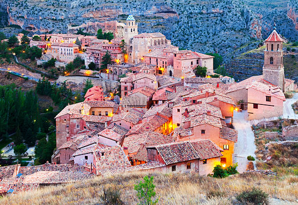 istock spanish mountains town in evening. Albarracin 187462129
