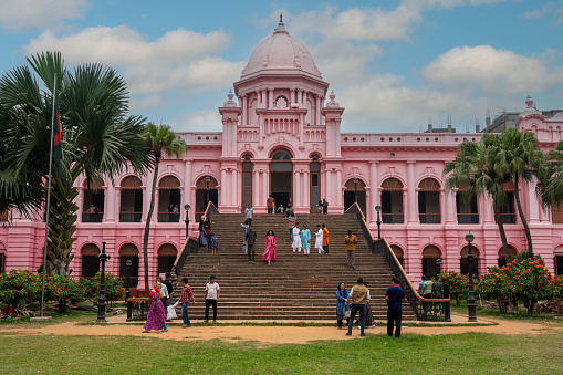 Located on the banks of the Buriganga River, the former residence of the Nawab of Dhaka has been designated as an Old Dhaka Heritage Site and is now a museum.\nVisitors to the museum are clearly visible.