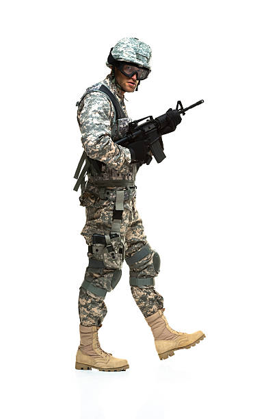 istock Soldier walking with his rifle 187462865