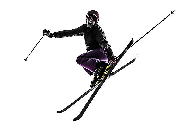 one caucasian woman skier skiing jumping in silhouette on white background