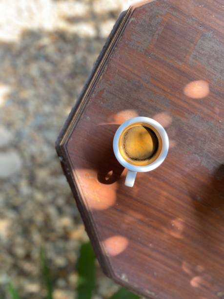 Top view of hot coffee  on wood table,