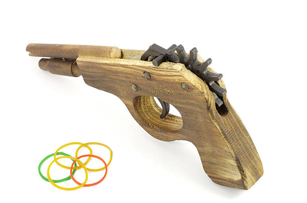 istock Wooden Catapult Gun with rubber on white background 187464780
