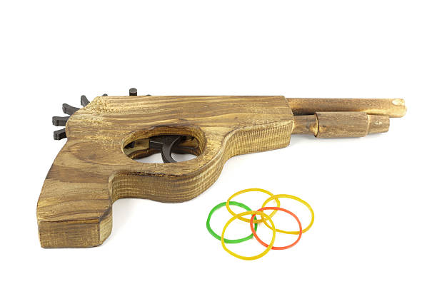 istock Wooden Catapult Gun with rubber on white background 187464782