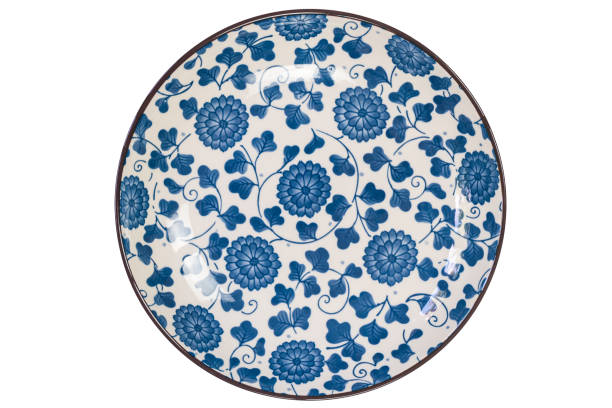 istock Top view of blue flowers pattern ceramic plate with black edge. 1874674654