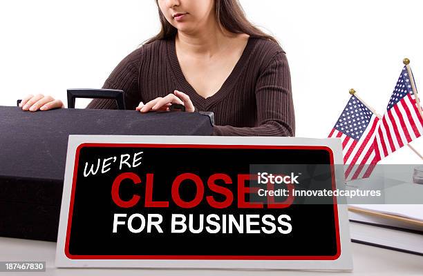 Office Worker With A Closed Sign Because Of Goverment Shutdown Stock Photo - Download Image Now