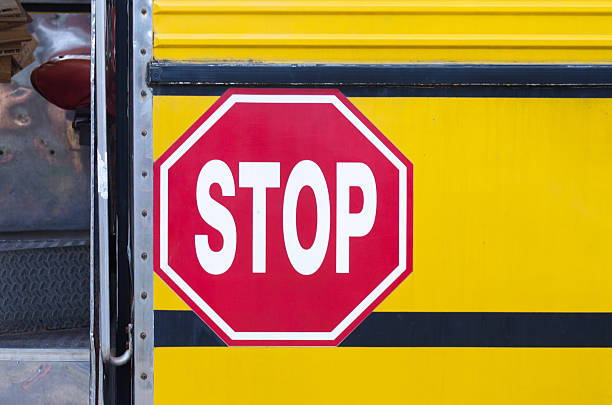 istock Stop sign on yellow bus 187468993