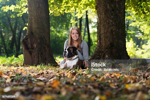Women Playing With Dog Stock Photo - Download Image Now - 20-29 Years, Adult, Adults Only