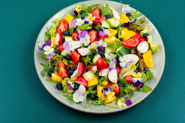 istock Vegetable salad decorated with flowers. 1874695171