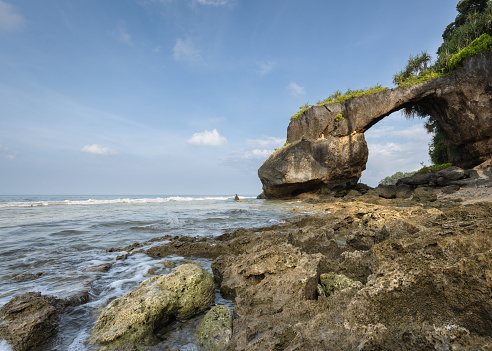 Natural bridge arch at the rocky scenic coast of a tropical Shaheed Dweep or Neil island of Andaman and Nicobar archipelago
