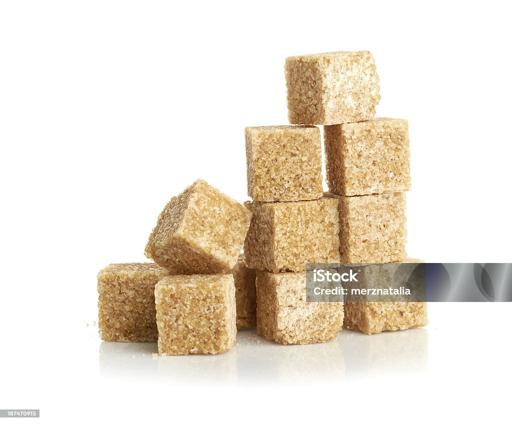 Marrom cubos de açúcar de cana-de-açúcar - Foto de stock de Açúcar Mascavo royalty-free