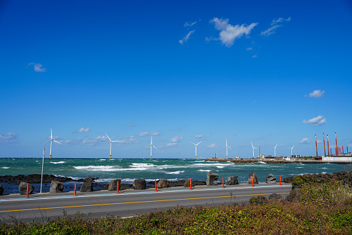 Sea with windmill in Jeju island