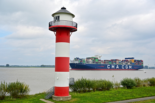 Container ship on the Elbe west of Hamburg in Lower Saxony, Germany