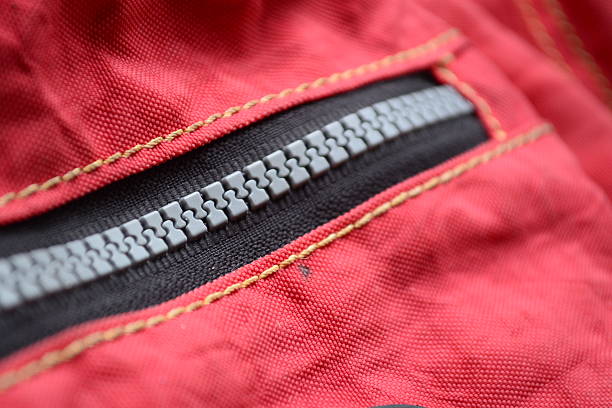 istock vivid red fabric with  Nylon plastic zippers 187472454