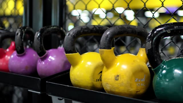 Kettlebells Of Different Weights In A Row In A Gym In Kuwait