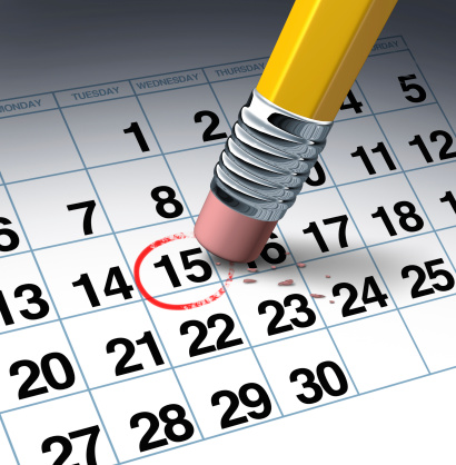 Cancel an appointment and change of schedule business concept with a pencil eraser erasing a highlighted red circle as a symbol of time management by rescheduling.