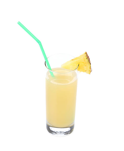 istock Pineapple juice in a glass. Close up 187476855
