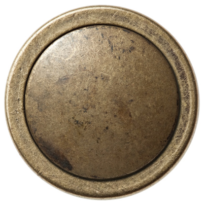 Metal sewing button, isolated
