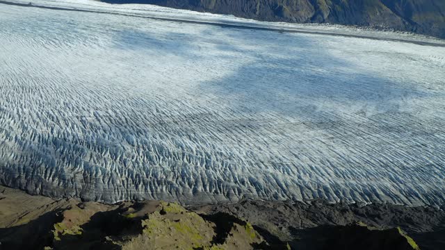 Aerial view of glacier from above, 4k stock aerial footage
