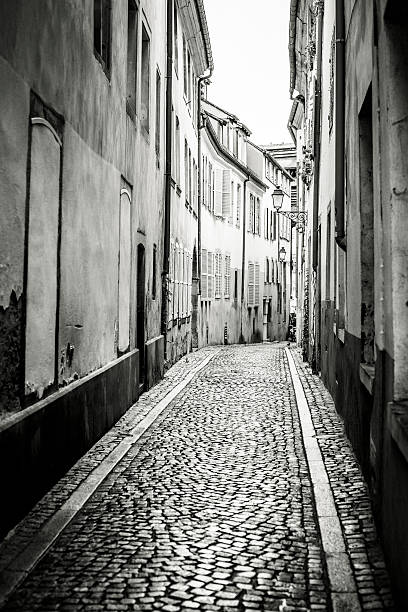 istock Narrow alley, cobblestone 187479637