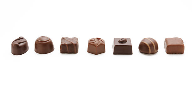 istock Row of luxury chocolates on white background 187480653