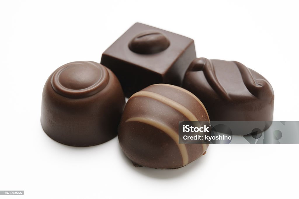 Isolato spruzzata di cioccolato quattro di lusso su sfondo bianco - Foto stock royalty-free di A forma di blocco