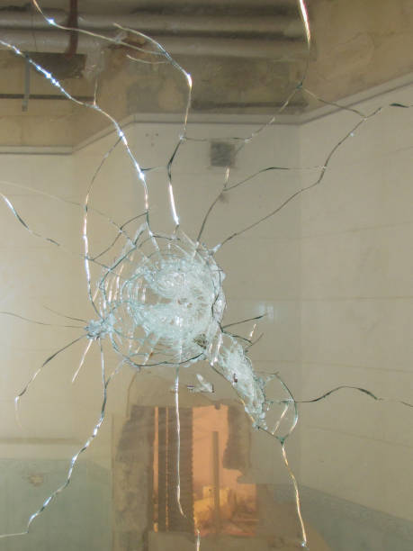 istock Damaged Mirror on Cracked Glass Background 1874810813